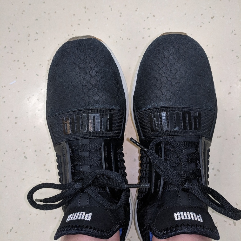 Puma black athletic shoes